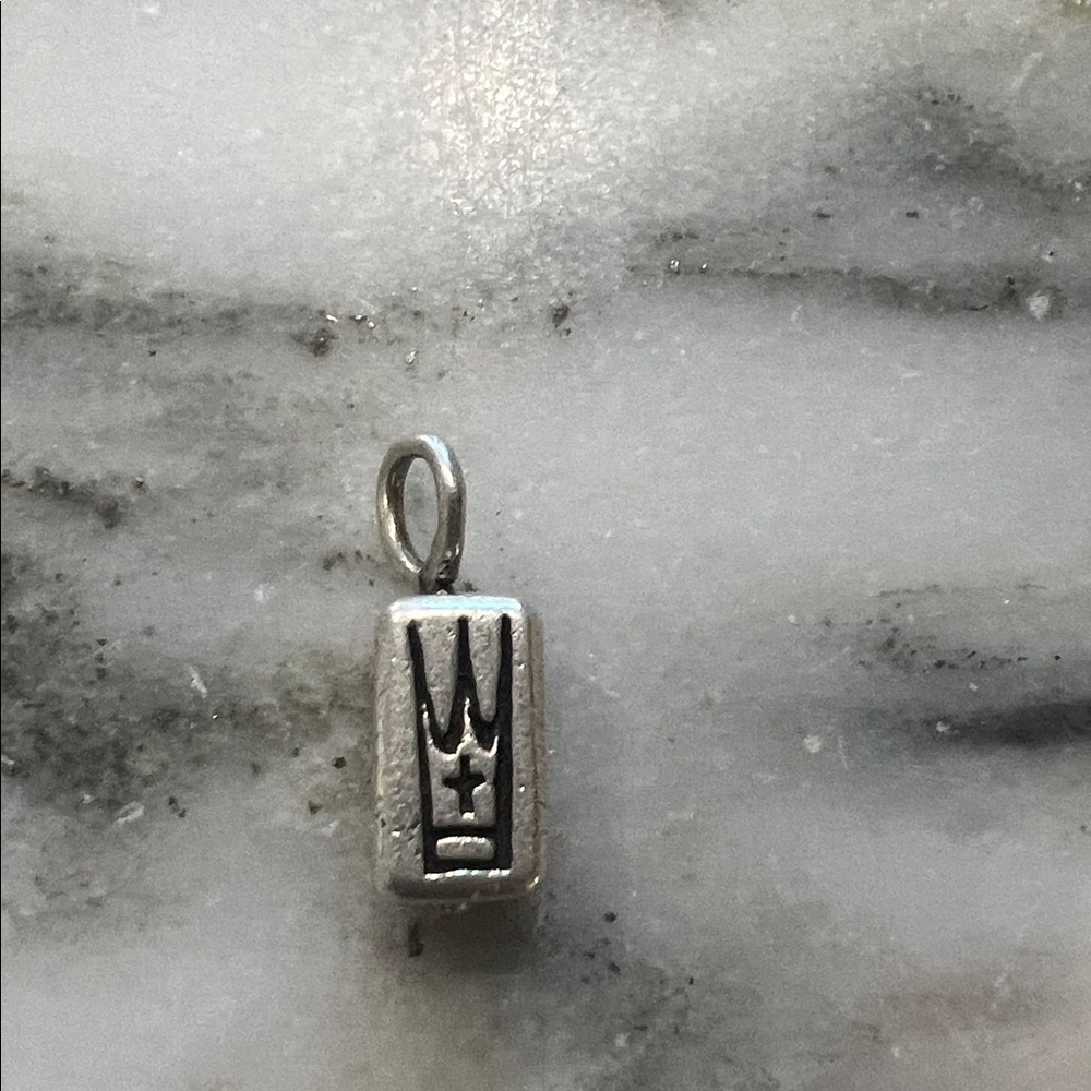 James Avery spinning alpha omega retired charm